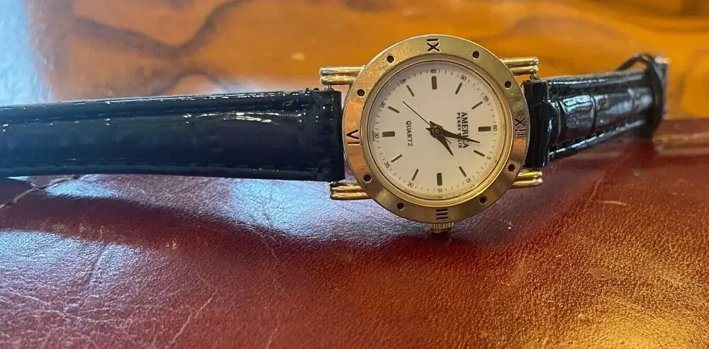 Women's 27mm Gold Tone America Perry Ellis Watch with Black Leather Band
